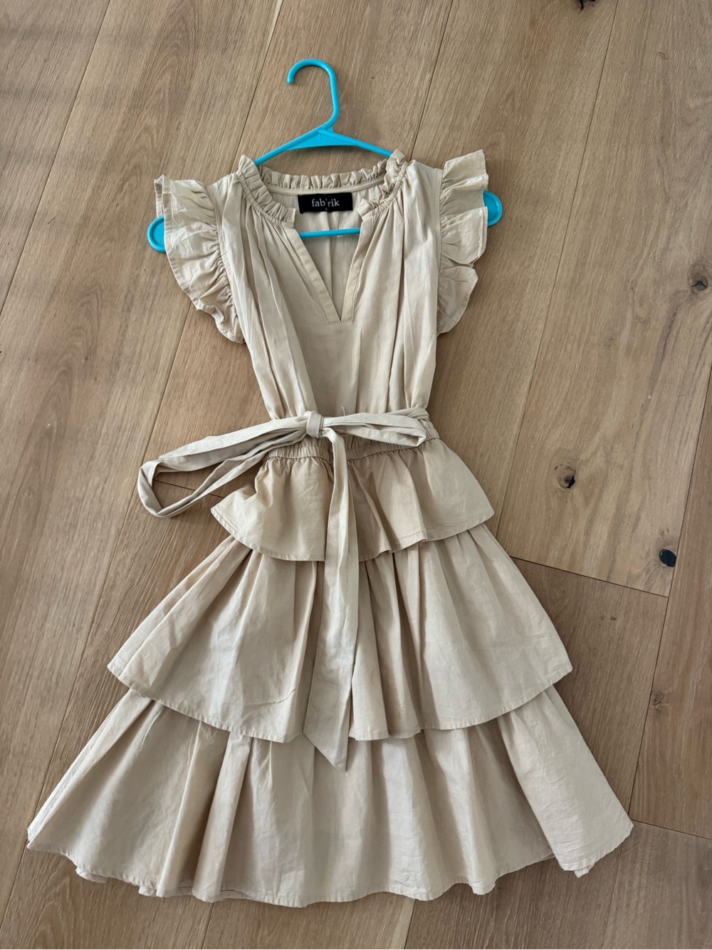 fab'rik Cream Tiered Midi Dress with Waist Tie and Ruffle Sleeves